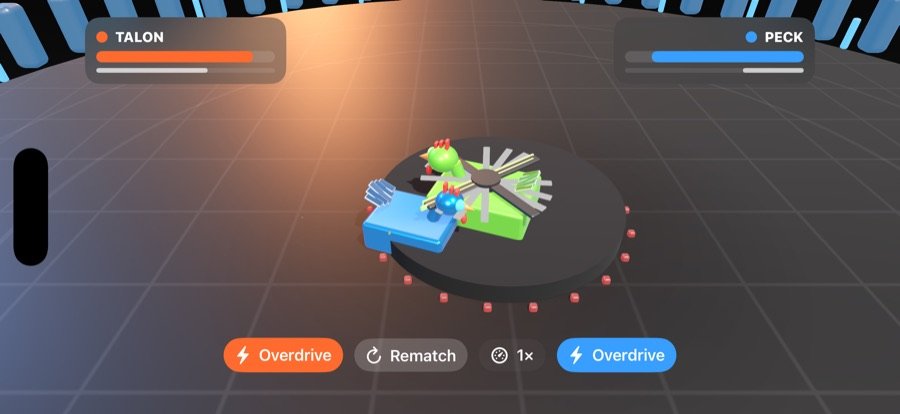 Two bots fighting in the arena with health bars and an Overdrive control.